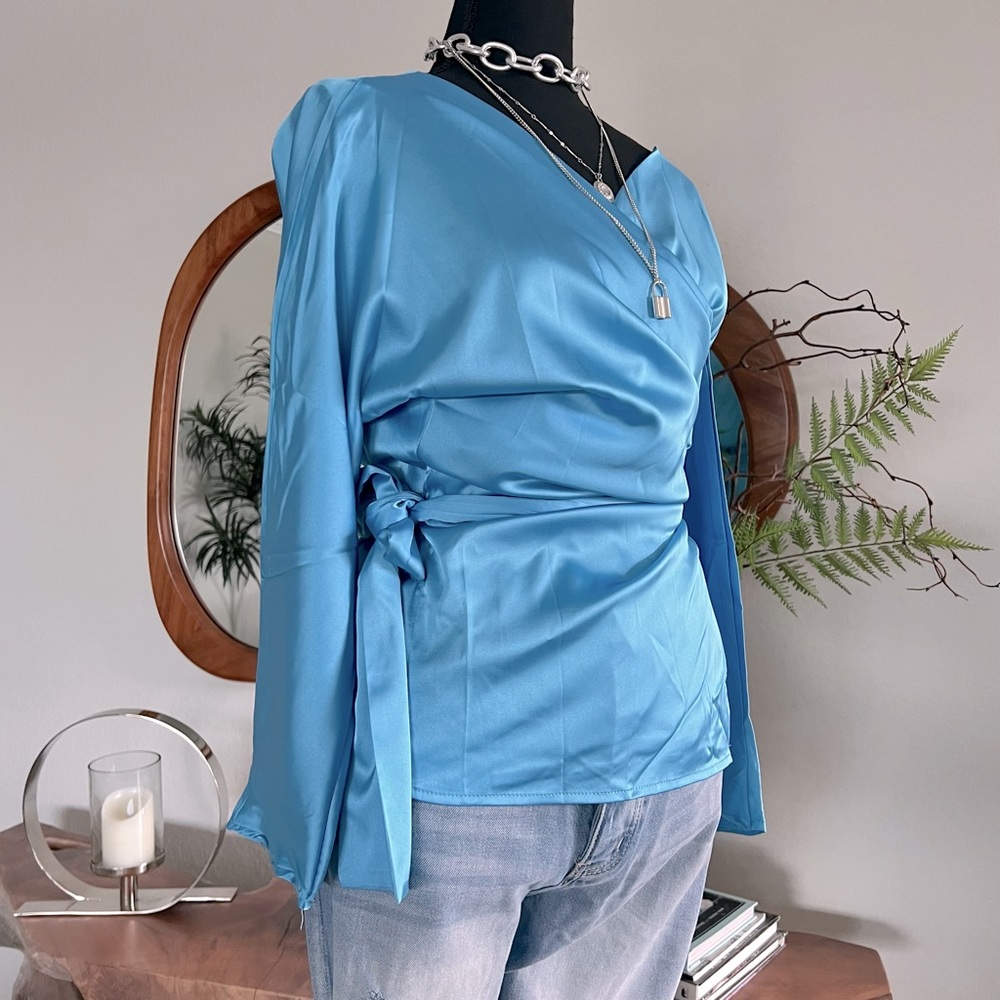 NWOT Silky Bell Sleeved Wrap Blouse.